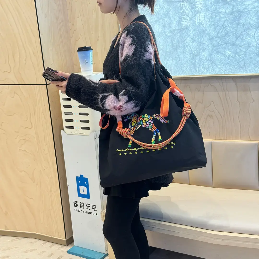 Women Embroidered Crossbody Bag with Ballchain Design - Image 136