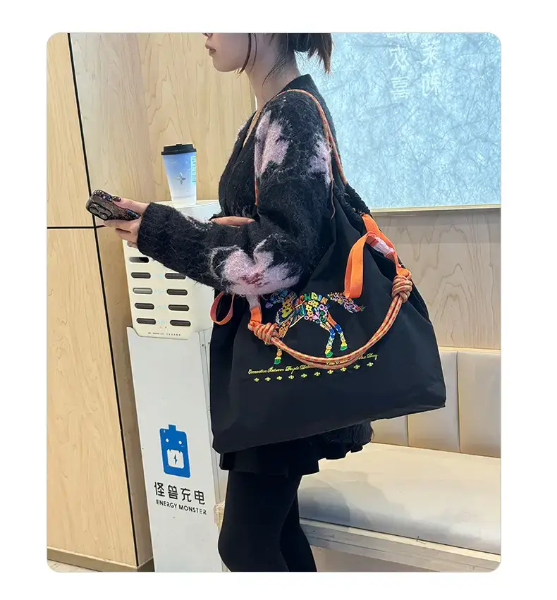 Women Embroidered Crossbody Bag with Ballchain Design — feature 15