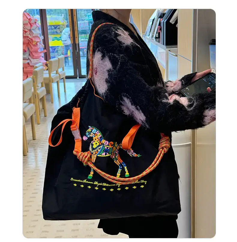 Women Embroidered Crossbody Bag with Ballchain Design — feature 21