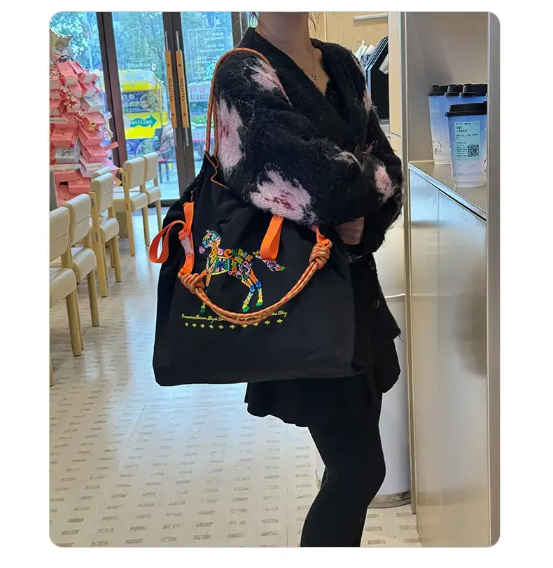 Women Embroidered Crossbody Bag with Ballchain Design — feature 24