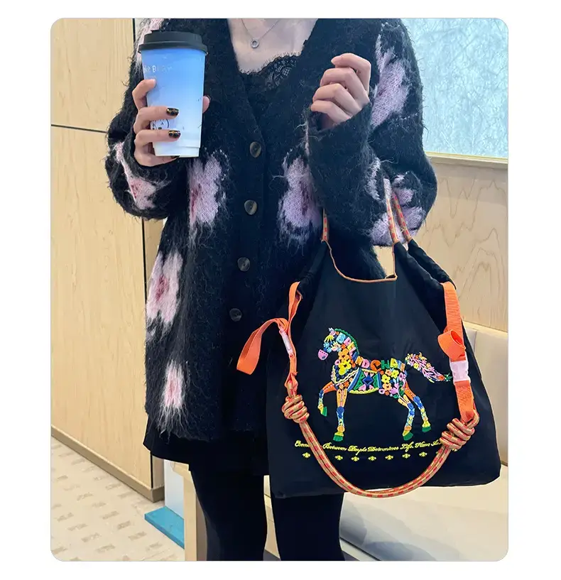 Women Embroidered Crossbody Bag with Ballchain Design — feature 26