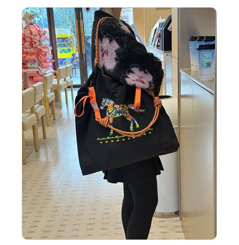 Women Embroidered Crossbody Bag with Ballchain Design — feature 27