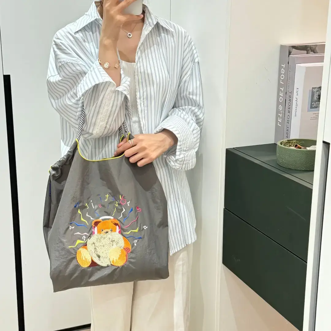 Women Embroidered Crossbody Bag with Ballchain Design - Image 109