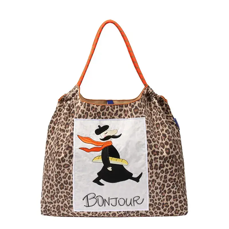 Women Embroidered Crossbody Bag with Ballchain Design - Image 127