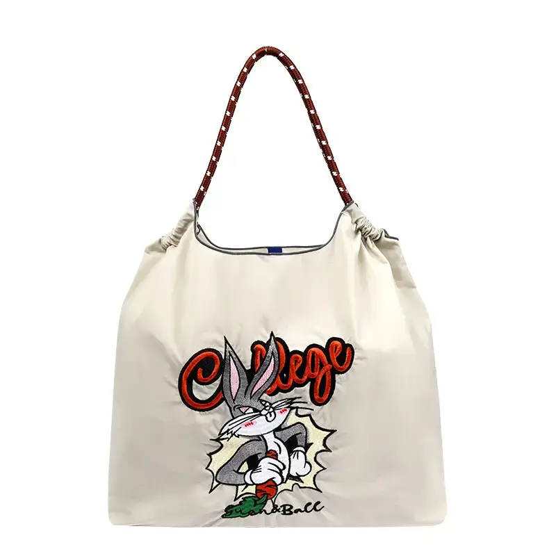 Women Embroidered Crossbody Bag with Ballchain Design - Image 135