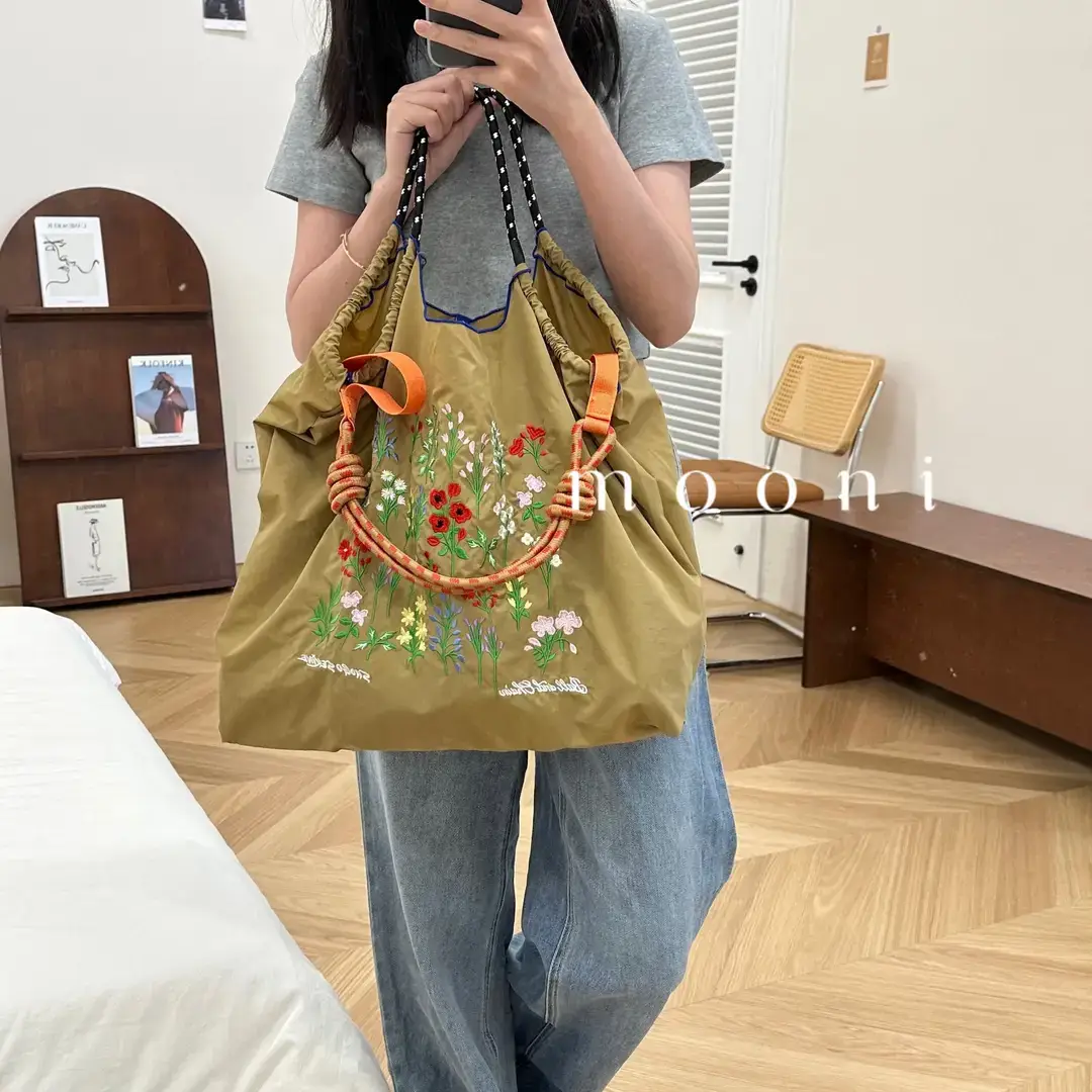 Women Embroidered Crossbody Bag with Ballchain Design - Image 46