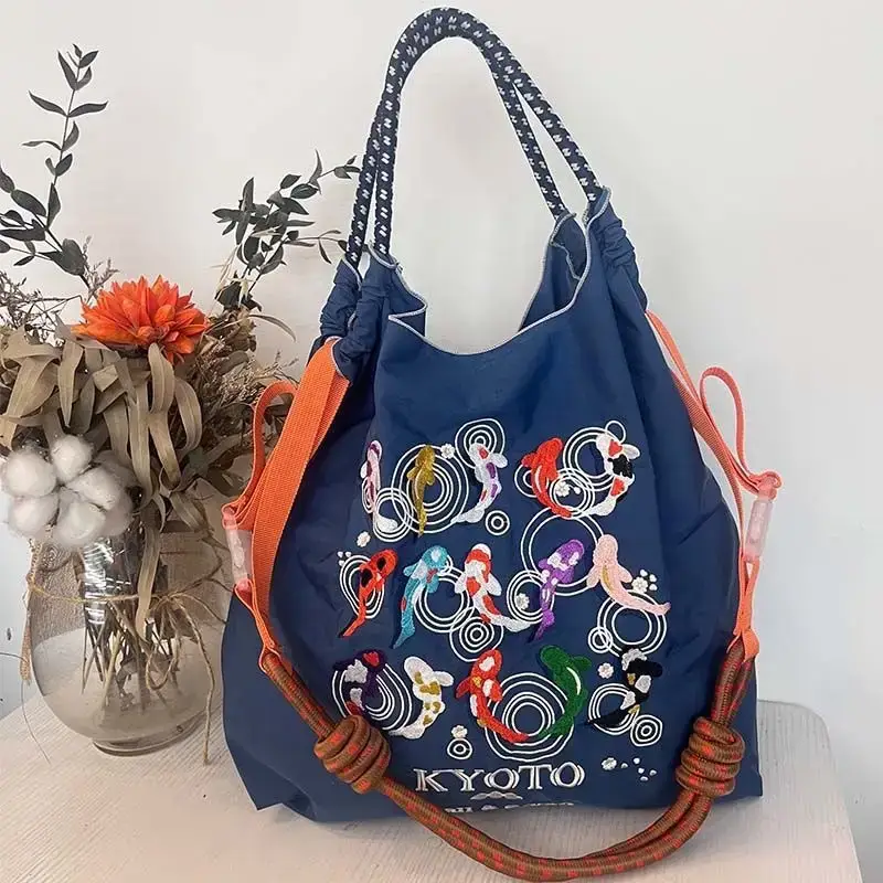Women Embroidered Crossbody Bag with Ballchain Design - Image 55