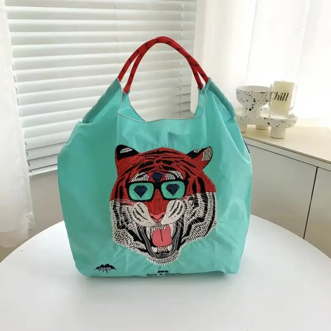 Women Embroidered Crossbody Bag with Ballchain Design - Image 65