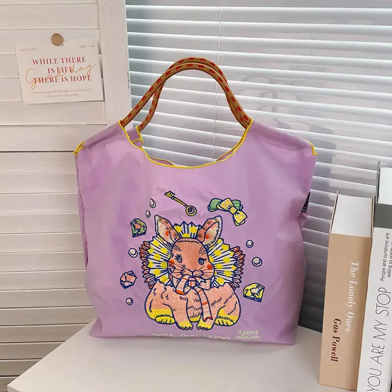 Women Embroidered Crossbody Bag with Ballchain Design - Image 82