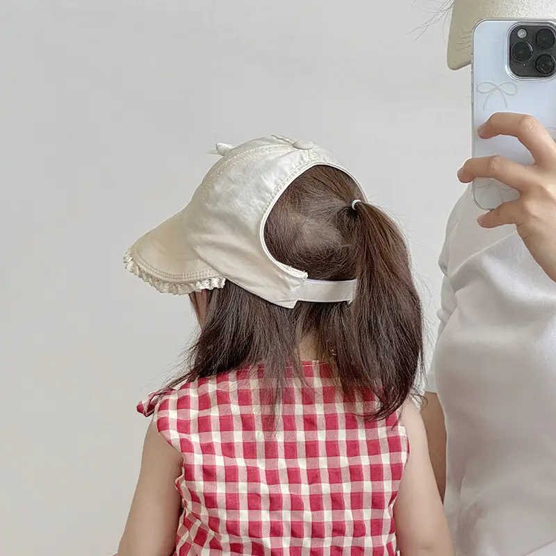 Baby's Brown Bow Cap with Pom Pom Edge — feature 3