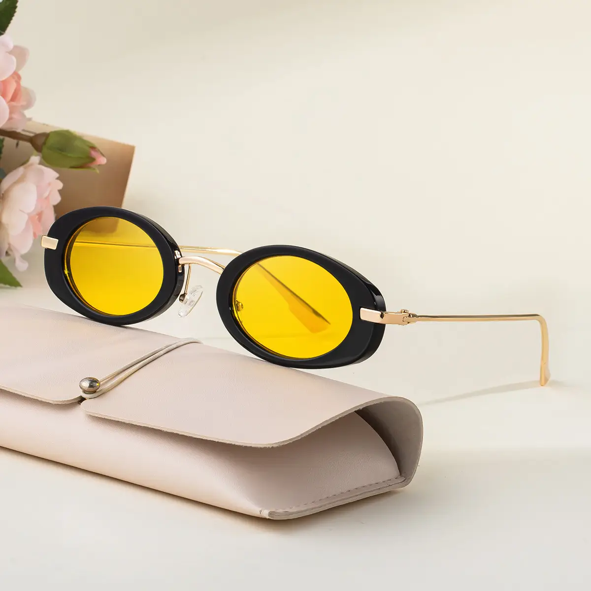 Women's Black Oval Sunglasses with Gold Frame - Image 5