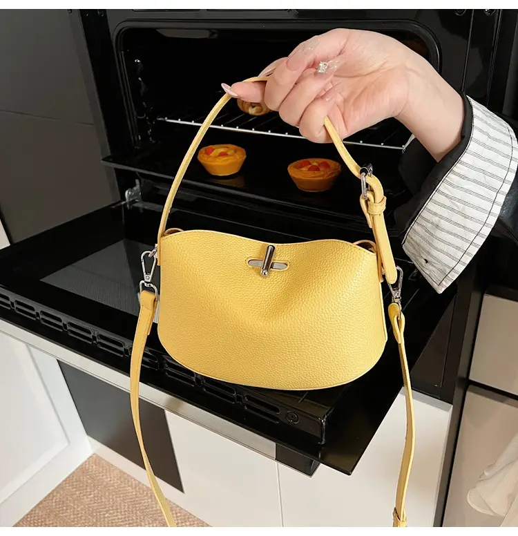 Women's Yellow Leather Shoulder Crossbody Bag with Doll Decor — feature 11