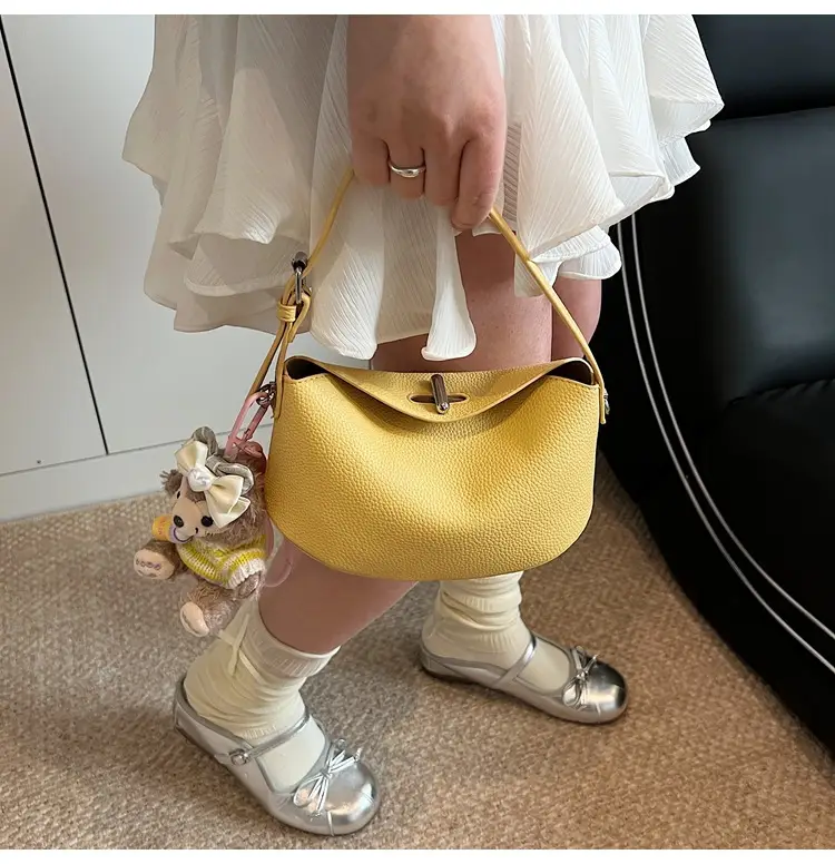 Women's Yellow Leather Shoulder Crossbody Bag with Doll Decor — feature 14