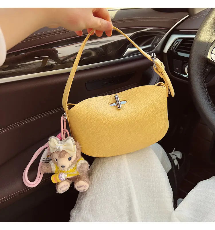 Women's Yellow Leather Shoulder Crossbody Bag with Doll Decor — feature 3