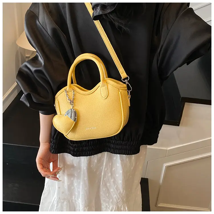 Women's White Leather Bucket Bag 2025 Summer Fashion — feature 35