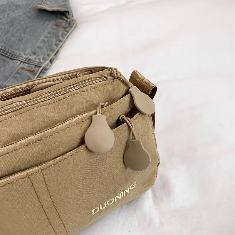 Women's Tan Crossbody Bag with Embellished Tassels - Image 5