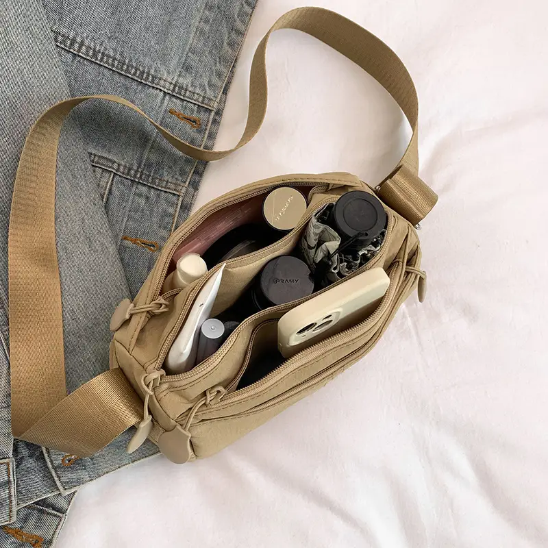 Women's Tan Crossbody Bag with Embellished Tassels - Image 6