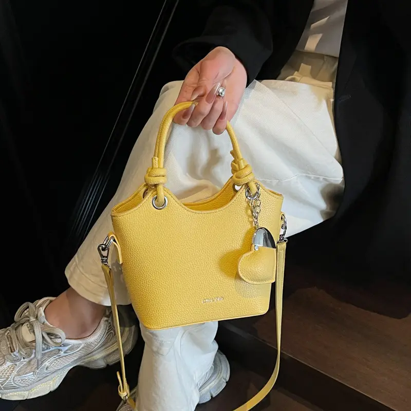 Women's Textured Crossbody Bag with Heart Charm