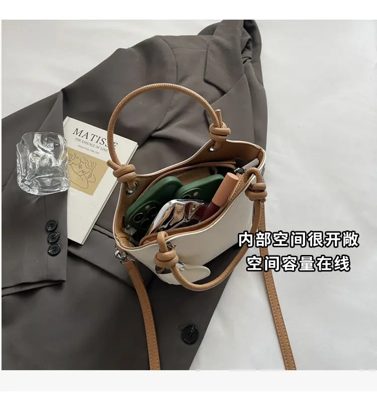 Women's Textured Crossbody Bag with Heart Charm — feature 10