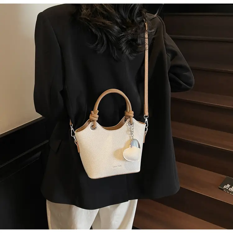 Women's Textured Crossbody Bag with Heart Charm — feature 24