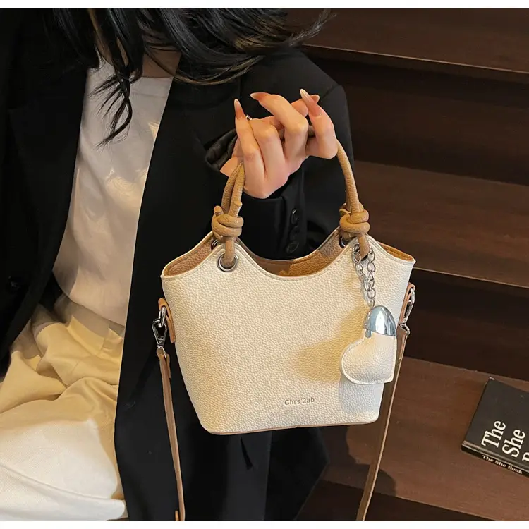 Women's Textured Crossbody Bag with Heart Charm — feature 25