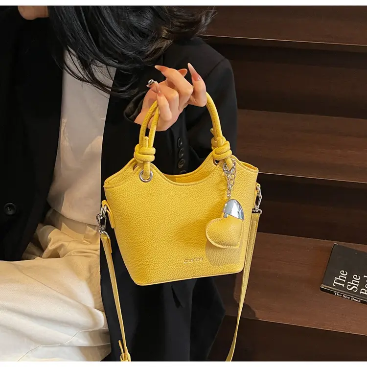 Women's Textured Crossbody Bag with Heart Charm — feature 28