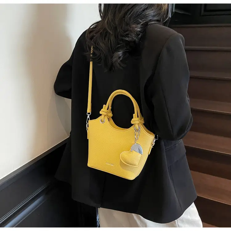 Women's Textured Crossbody Bag with Heart Charm — feature 29