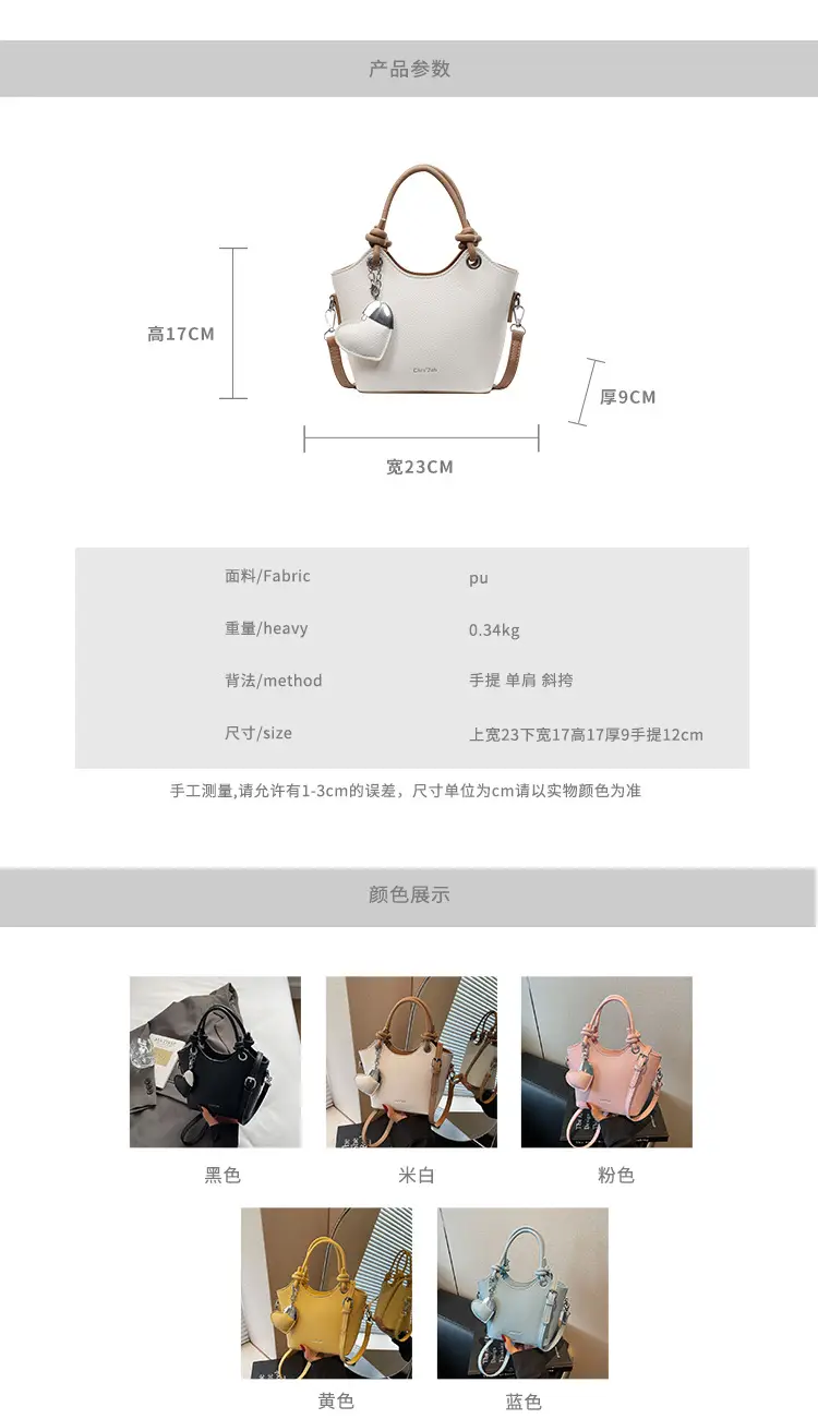 Women's Textured Crossbody Bag with Heart Charm — feature 3