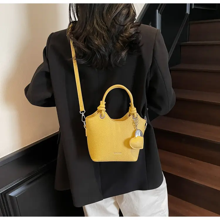 Women's Textured Crossbody Bag with Heart Charm — feature 30