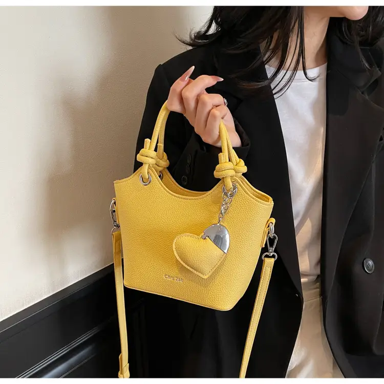 Women's Textured Crossbody Bag with Heart Charm — feature 31