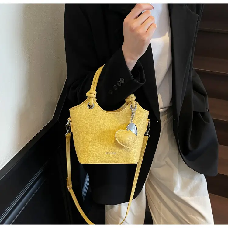 Women's Textured Crossbody Bag with Heart Charm — feature 32