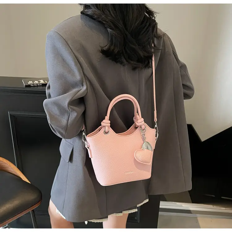 Women's Textured Crossbody Bag with Heart Charm — feature 33