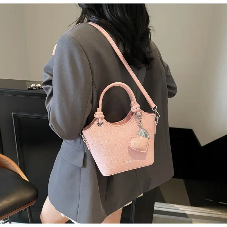 Women's Textured Crossbody Bag with Heart Charm — feature 36