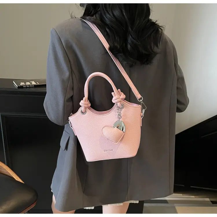 Women's Textured Crossbody Bag with Heart Charm — feature 37