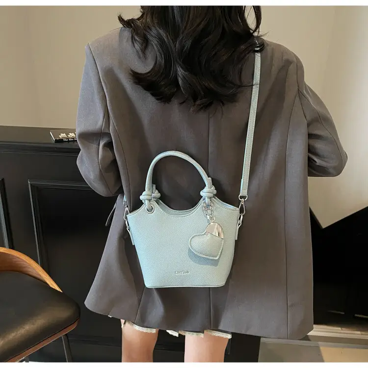Women's Textured Crossbody Bag with Heart Charm — feature 39