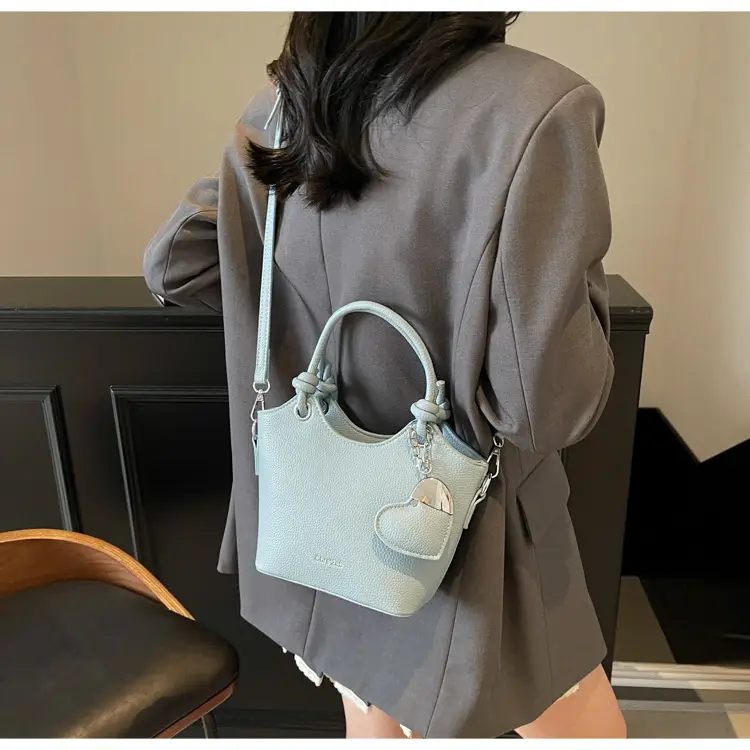 Women's Textured Crossbody Bag with Heart Charm — feature 40