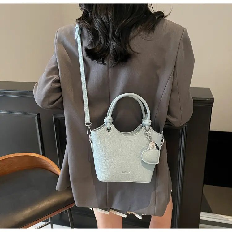 Women's Textured Crossbody Bag with Heart Charm — feature 41