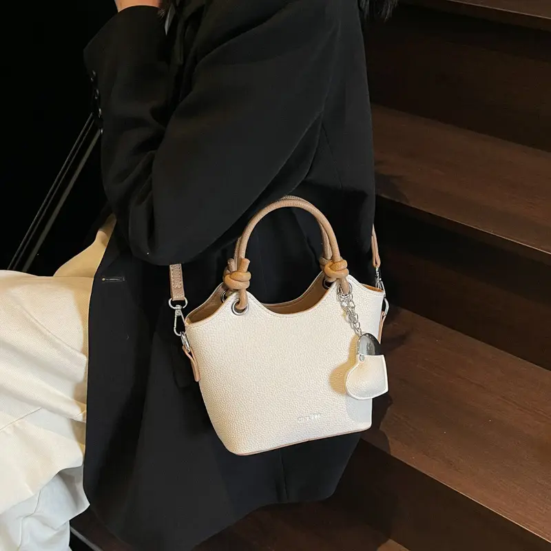 Women's Textured Crossbody Bag with Heart Charm