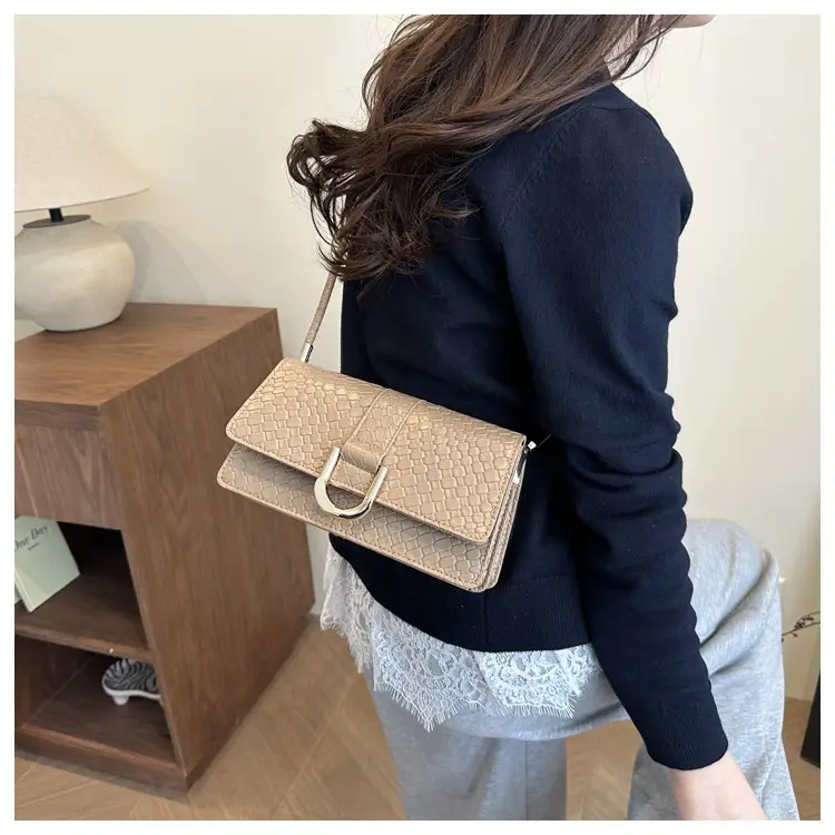 Black Textured Shoulder Bag with Gold Hardware — feature 10
