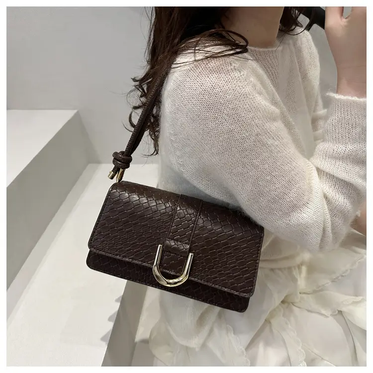Black Textured Shoulder Bag with Gold Hardware — feature 11