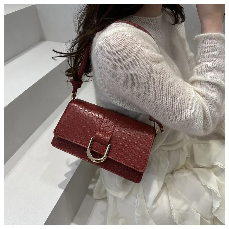 Black Textured Shoulder Bag with Gold Hardware — feature 13