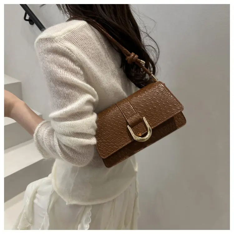 Black Textured Shoulder Bag with Gold Hardware — feature 15