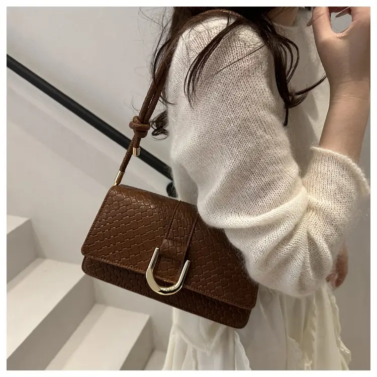 Black Textured Shoulder Bag with Gold Hardware — feature 16