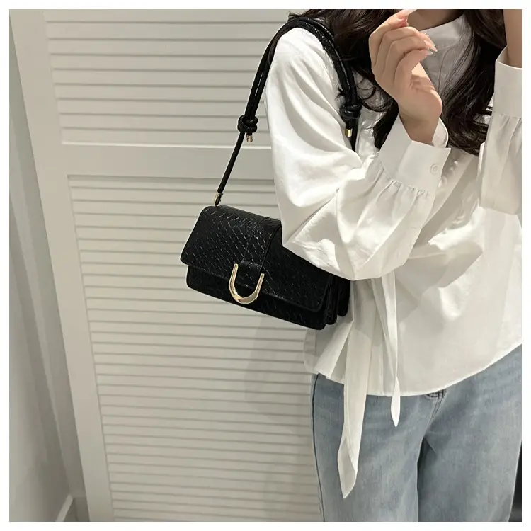 Black Textured Shoulder Bag with Gold Hardware — feature 17