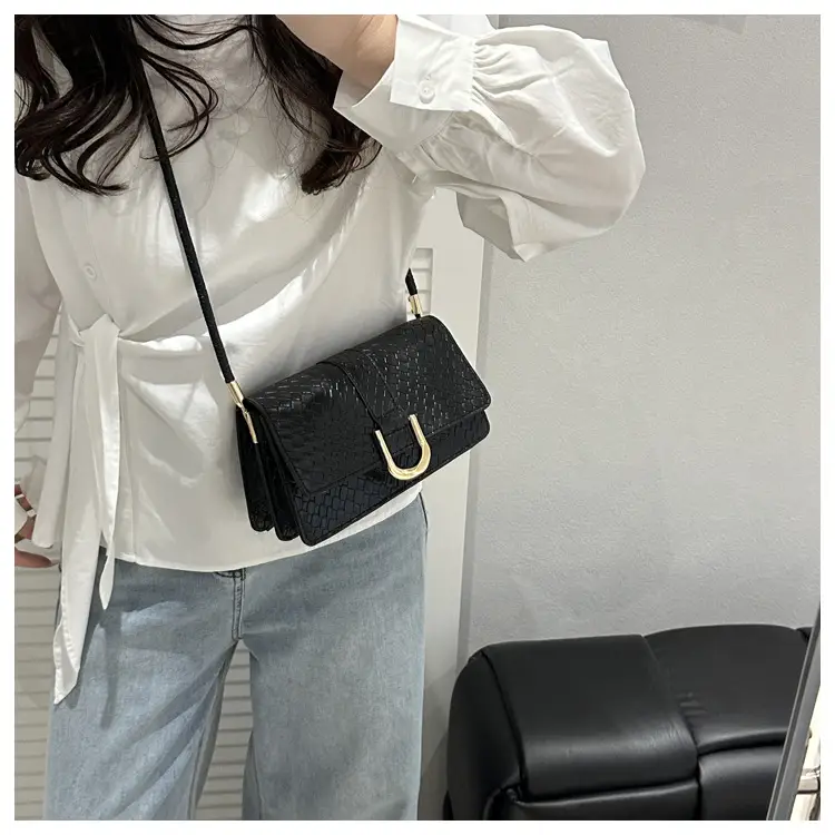 Black Textured Shoulder Bag with Gold Hardware — feature 18