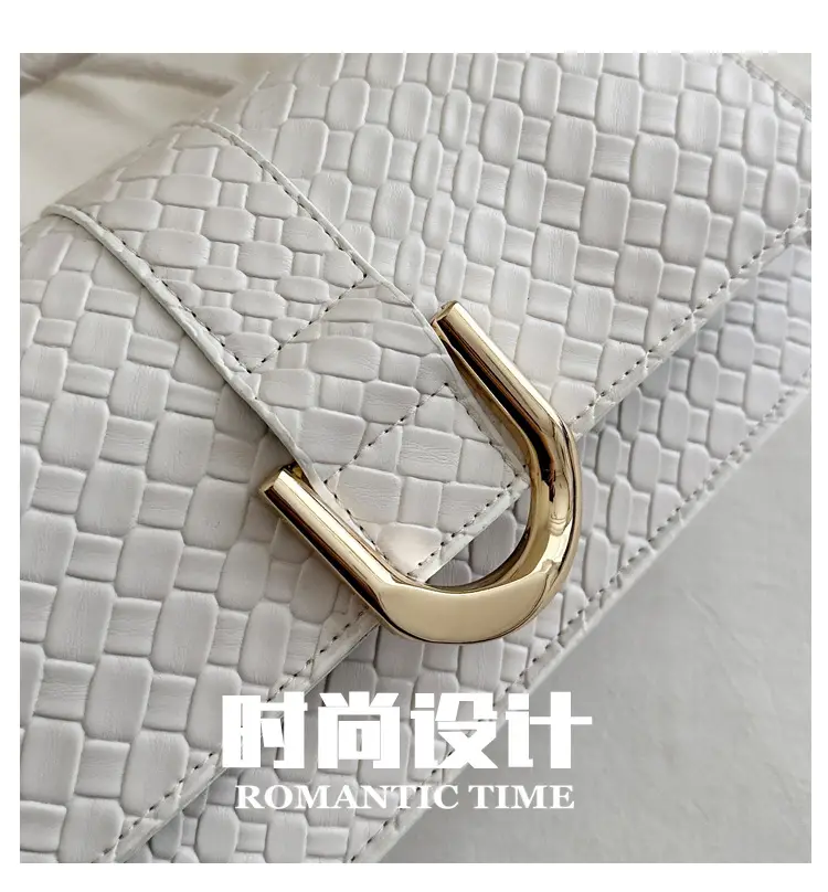 Black Textured Shoulder Bag with Gold Hardware — feature 2