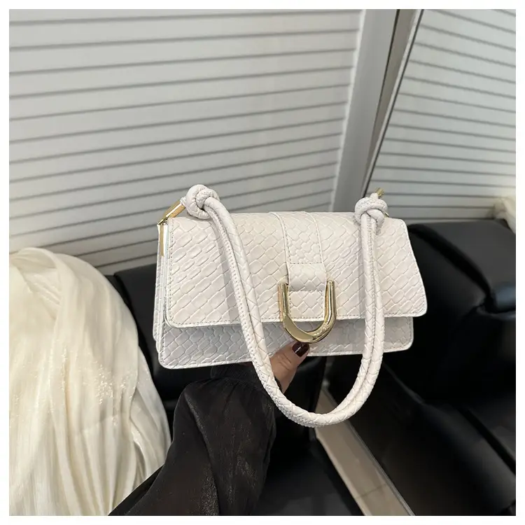 Black Textured Shoulder Bag with Gold Hardware — feature 22