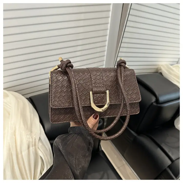 Black Textured Shoulder Bag with Gold Hardware — feature 23