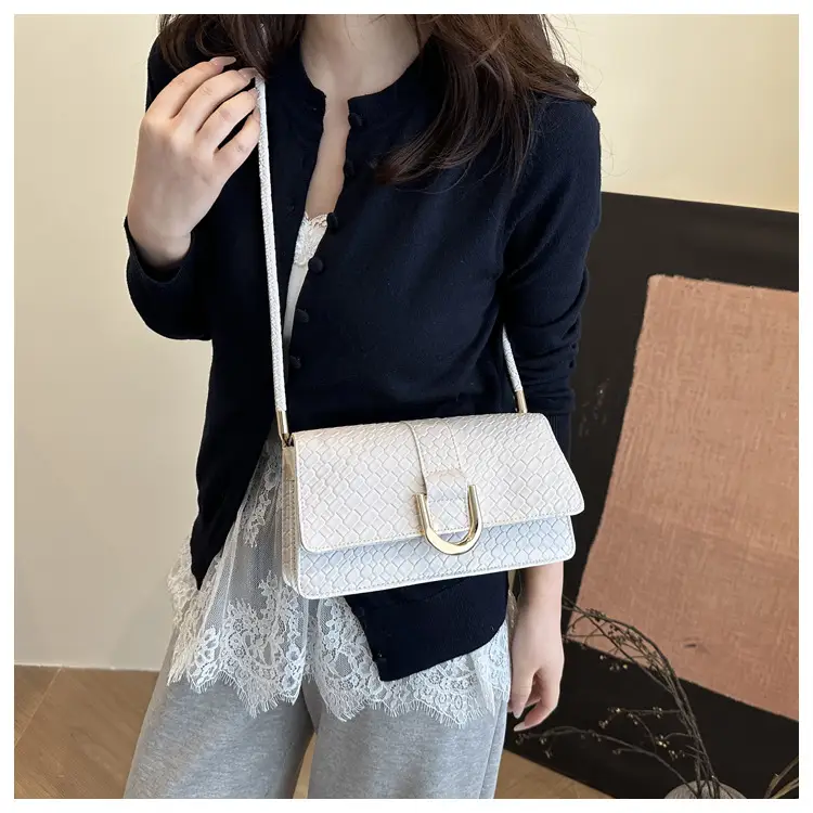 Black Textured Shoulder Bag with Gold Hardware — feature 7