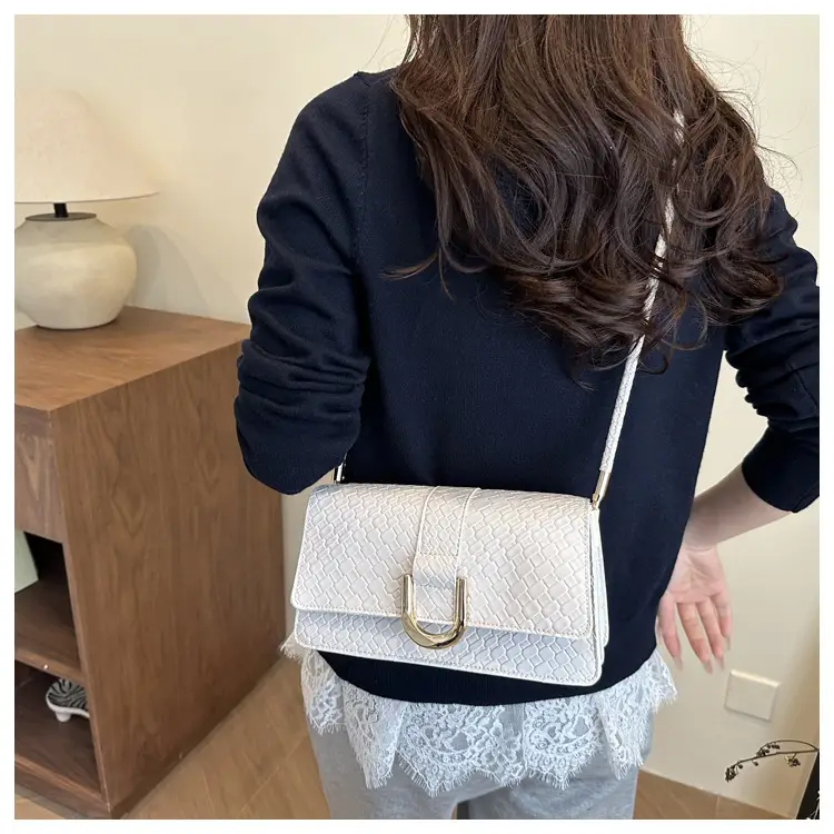Black Textured Shoulder Bag with Gold Hardware — feature 8